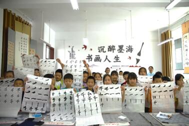 執(zhí)筆書塘埡，共繪振興圖